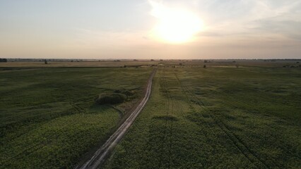 Aerial top view photo from flying drone of a land with down fields in countryside. High quality photo