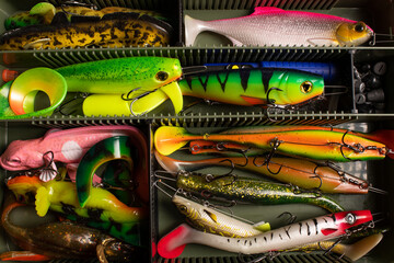 Soft fishing lures in a tackle box