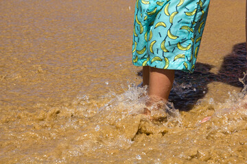 child playing in the water