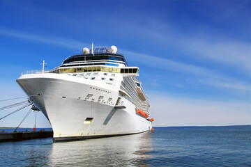 Fototapeta na wymiar Luxury cruise ship in port on sunny day 