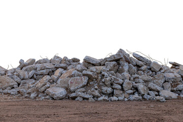 Isolated concrete waste, which has been demolished, destroyed the old road, and then dumped on the...