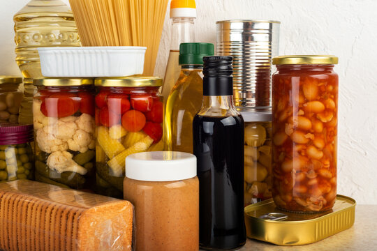 Emergency survival food set on white kitchen table