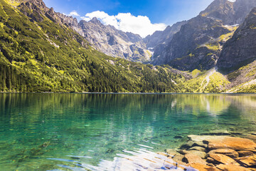 Lake of Morskie Oko or Eye of the Sea, in the High Tatras mountain range of Tatra National Park - obrazy, fototapety, plakaty