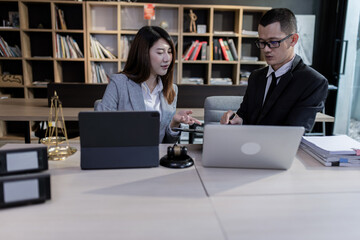 Lawyer meeting and lawyer hands working with documents on table office, law and justice concept, law signing contract.