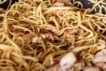 cooking Japanese noodles with chicken