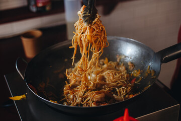 cooking Japanese noodles with chicken