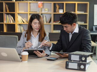 Person analyzing figures, Two businessman working on tablet and new startup marketing idea presentation, Business meeting discussion startup concept.	
