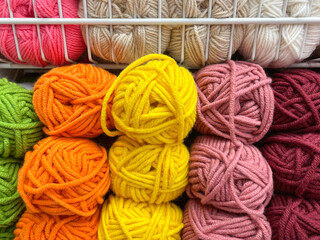 Balls of yarn for knitting. The concept of needlework and knitting. Selective focus