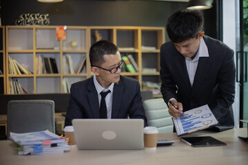 Team of business people working together in the office, 
Business teamwork concept.