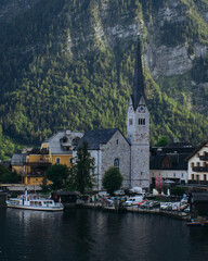 Fototapeta premium The mountain town of Hallstatt surrounded by mountains. Hallstatt old town and Hallstatter See lake in Upper Austria. Hallstatt is a village in the Salzkammergut region near Salzburg in Austria. 