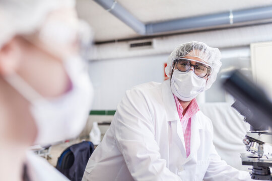 colleagues scientists working at laboratory