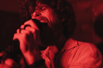 Man singing with a rock band