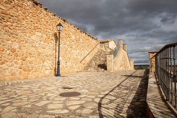 the town wall below the Puerta de las Heras entry gate to Monteagudo de las Vicarias, province of Soria, Castile and León, Spain 