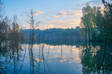 Autumn landscape sunset on the river bank. Wonderful nature, beautiful natural background.