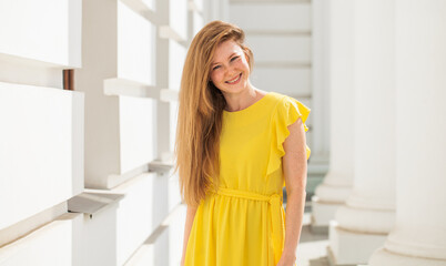 Portrait of a red-haired young woman