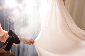 Steaming of bridal gown before wedding