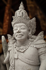 Bust of a stone statue of the Holy Spring Water Temple in Tampaksiring, Bali