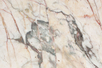 Beige marble stone with veins textured background