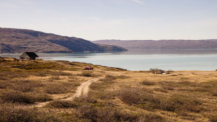 Obraz premium Long distance hiking on the Arctic Circle Trail between Sisimiut and Kangerlussuaq in Greenland.