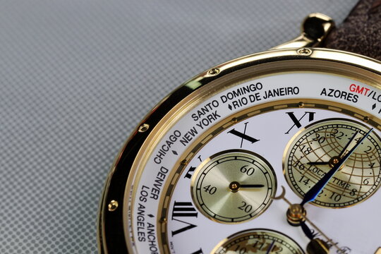 close up on Time zone cities name on luxury world time watch bezel.