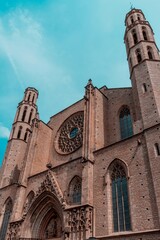 Fototapeta na wymiar Barcelona, Spain - August 18, 2022. Church of Santa Maria del Mar is a minor basilica located in the city of Barcelona, Catalonia, Spain. It was built between 1329 and 1383.