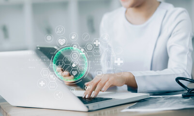 Medicine doctor using digital healthcare and network connection on hologram modern virtual screen...