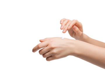 Beautiful young woman hands with cream. Woman applies cream on her hands on grey background. Palms down with smooth skin on hands, nice natural short nails.