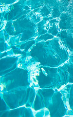 blue color background of swimming pool water with ripples in bahamas