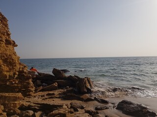 waves hitting Rocks on the shore of the Arabian Sea