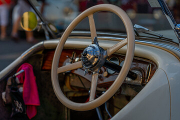 beige steering wheel of an old-timer car, Slovakia, Europe