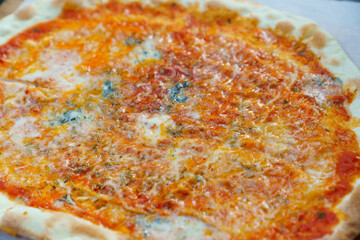 Roman pizza with cheese and tomato paste