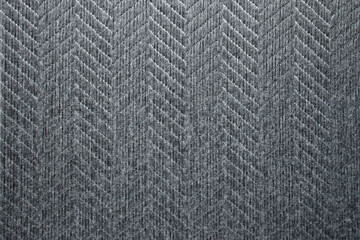 Fabric background. Sticky textured gray fabric with pattern close up. Fabric for the manufacture of fabric blinds or mat, wallpaper