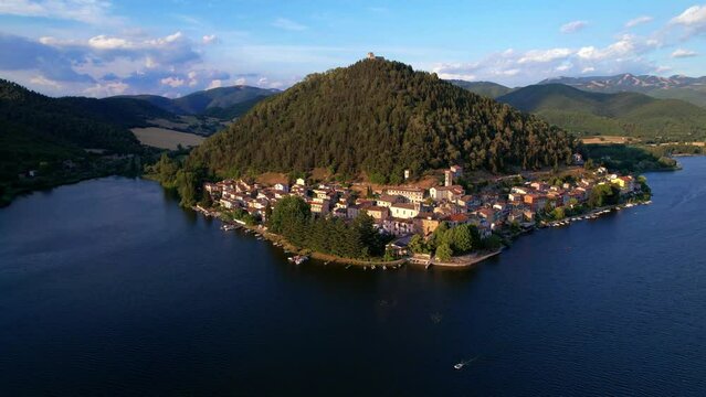 Most beautiful scenic Italian lakes - small picturesque lake Piediluco with colorful houses in Umbria, Terni province. Aerial drone video