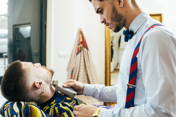 Barber working in a barbershop