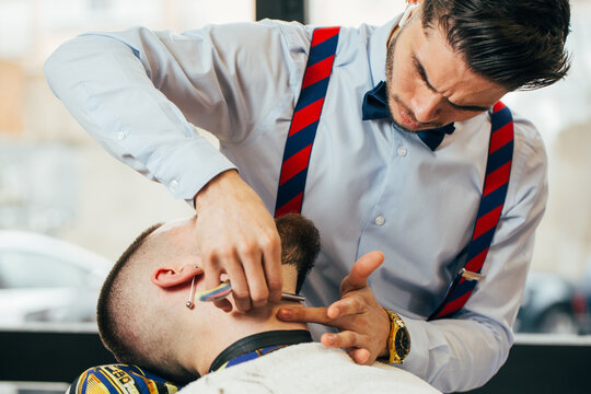 Barber working in a barbershop