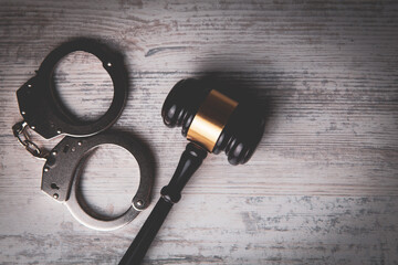 Legal law concept image - gavel and handcuffs