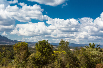 Landscape of the fields  and blue sky with clouds of Brumadinho, State of Minas Gerais, Brazil.