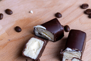 Chilled cottage cheese with sugar in chocolate