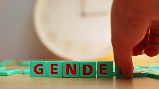 The word GENDER made of colorful scrabble tiles. Every young person, regardless of their sexual orientation or gender identity, deserves equal access to opportunities and services and their safety