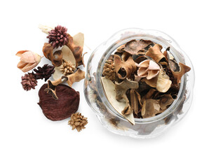 Aromatic potpourri of dried flowers in glass jar on white background, top view