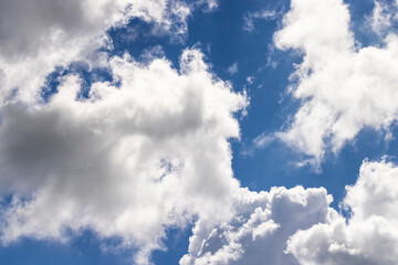 Blue sky with light clouds in windy weather