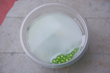 Thai dessert sago coconut milk in a cup.