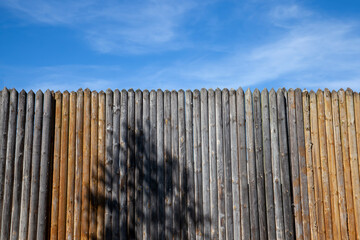 An old wooden fence in the countryside