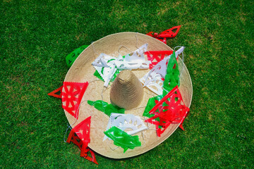 15 of September. Traditional Mexican hat, with decorative paper of three colors.