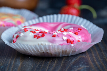 round donuts in glaze and with berry filling