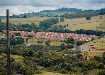 Naklejka premium Construção de casas para pessoas de baixa renda terem o próprio lar 