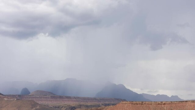 The mountains of Zion Nat. park in Southern Utah get washed over by a localized summer monsoon storm in this timelapse video. A single lightning strike is captured in the first second of the video.