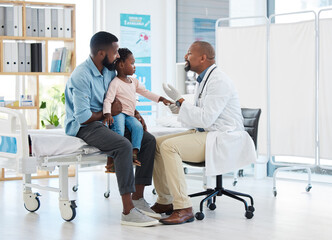 Pediatrician doctor consulting black kid patient for healthcare service, medical help and wellness check in hospital clinic. Friendly, trust and kind african family gp expert for healthy child advice