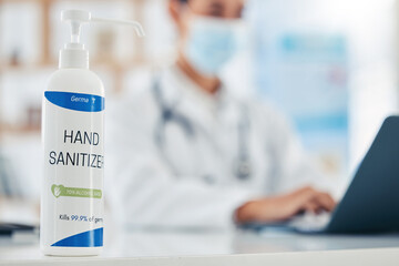 Covid, doctor and hand sanitizer or hygiene bottle on counter top, table or desk of medical...