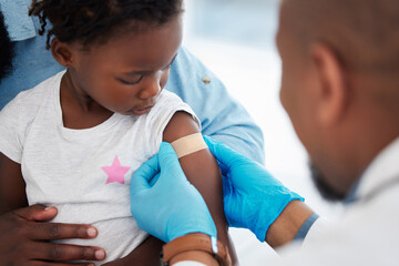 Child, healthcare vaccine and doctor with plaster for skin protection after injection appointment. Black kid and medical worker with bandage for healing of wound from needle medicine immunity. - obrazy, fototapety, plakaty